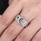 Emerald three-stone moissanite top view, 5cttw step-cut horizontal — Aurora Moissanite