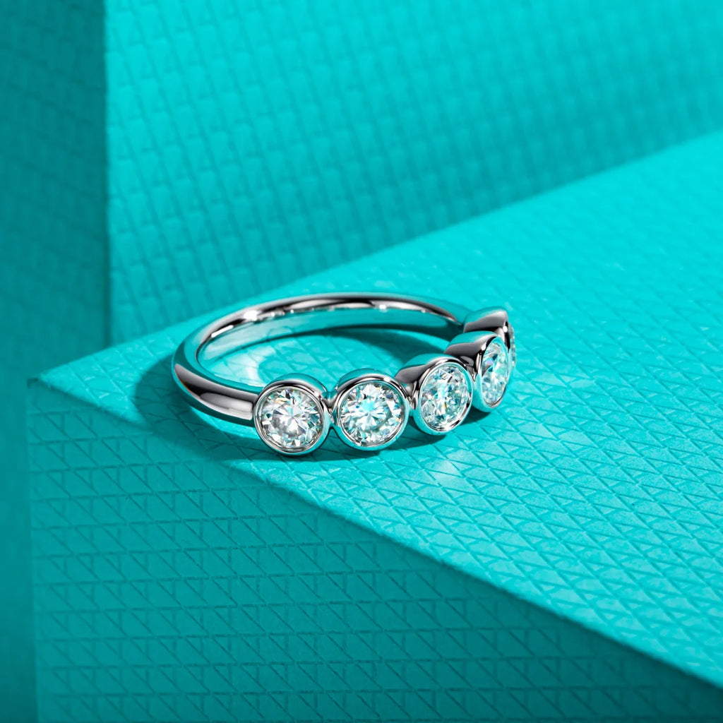 Moissanite bezel half eternity band 4mm, D color VVS1, bezel setting detail — Aurora Moissanite