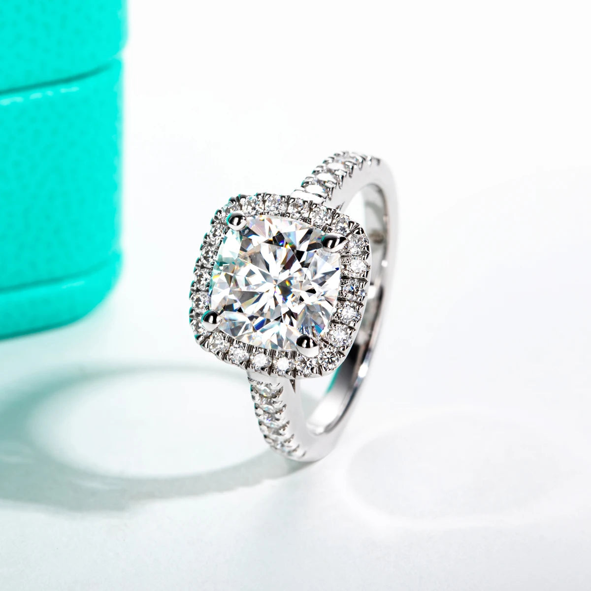 The Aela Ring worn — 3ct cushion moissanite halo, 18K gold — Aurora Moissanite