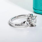The Vela Ring lifestyle — gray moissanite Claddagh Irish ring worn on finger — Aurora Moissanite