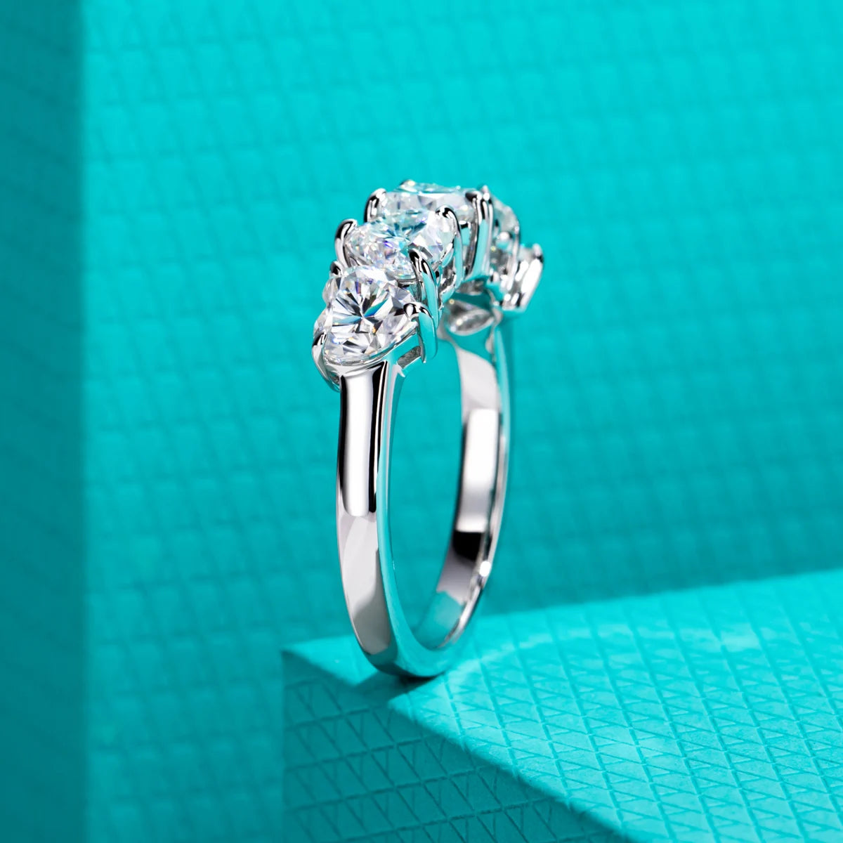 The Bloom Band lifestyle — heart moissanite wedding ring worn on finger — Aurora Moissanite