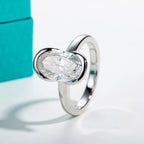 Oval moissanite 3ct D color VVS1, partial bezel setting detail — Aurora Moissanite
