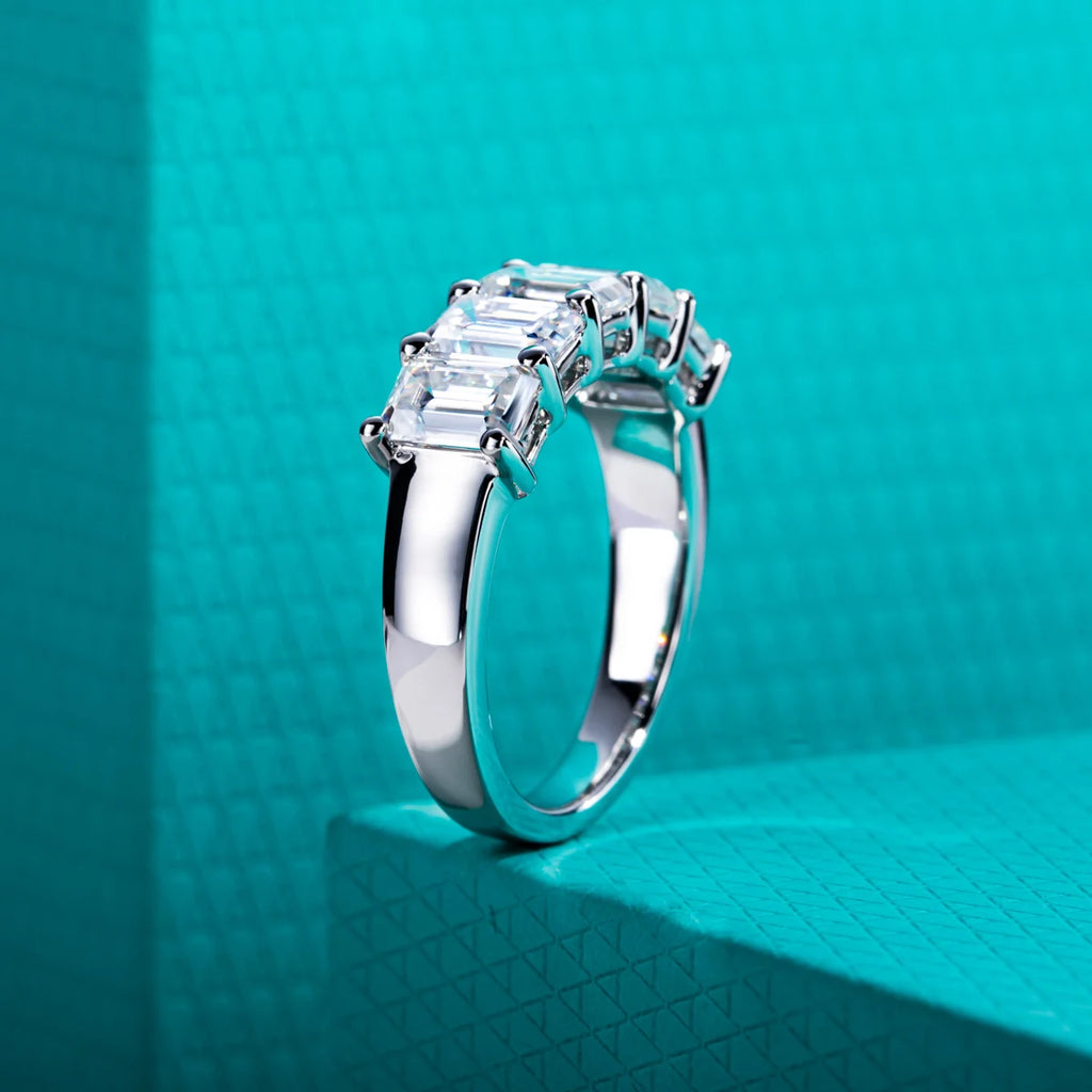 3cttw emerald cut moissanite band, side profile, S925 sterling silver — Aurora Moissanite