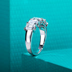 3cttw emerald cut moissanite band, side profile, S925 sterling silver — Aurora Moissanite