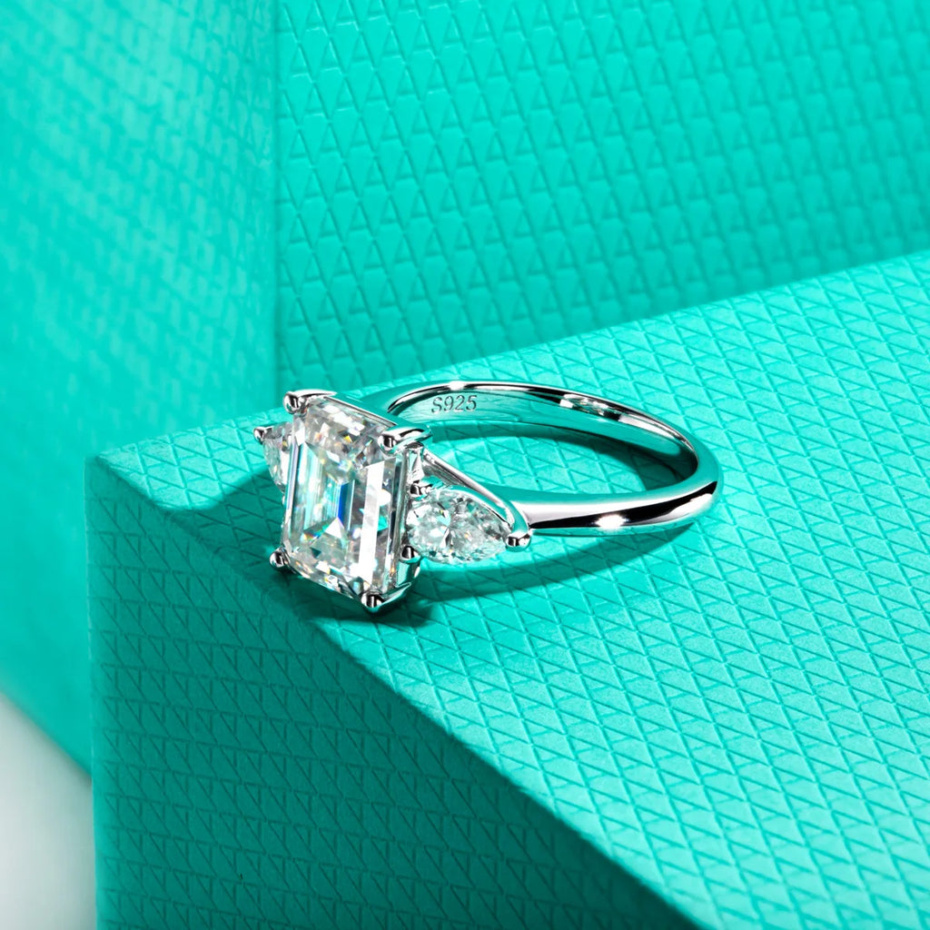 The Amara Ring — 4ct emerald pear moissanite two-stone, front view, 18K gold — Aurora Moissanite