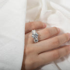 The Reas Ring worn — 5ct three-stone moissanite, rhodium plated, sizes 5–10 — Aurora Moissanite