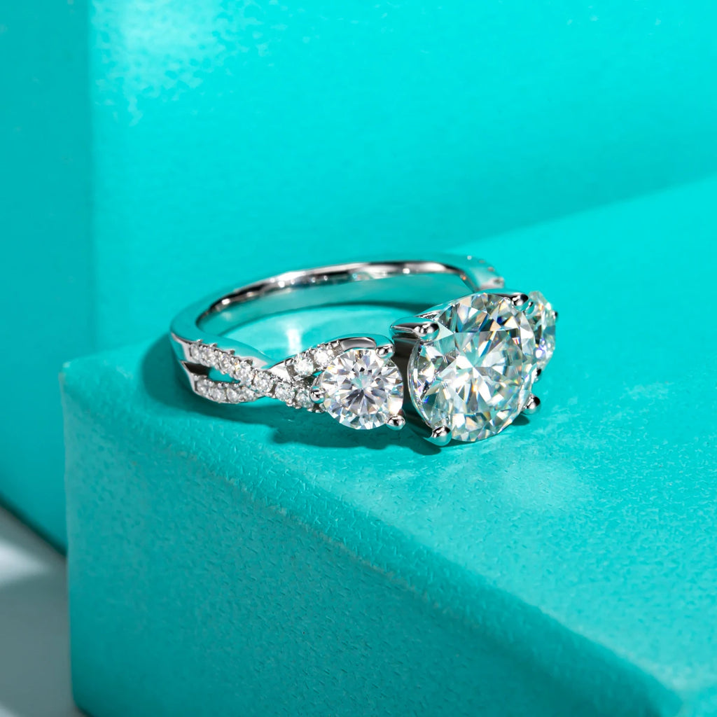 The Iola Ring lifestyle — three-stone moissanite worn on finger — Aurora Moissanite