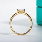 1ct emerald moissanite ring, side profile, 14K yellow gold — Aurora Moissanite