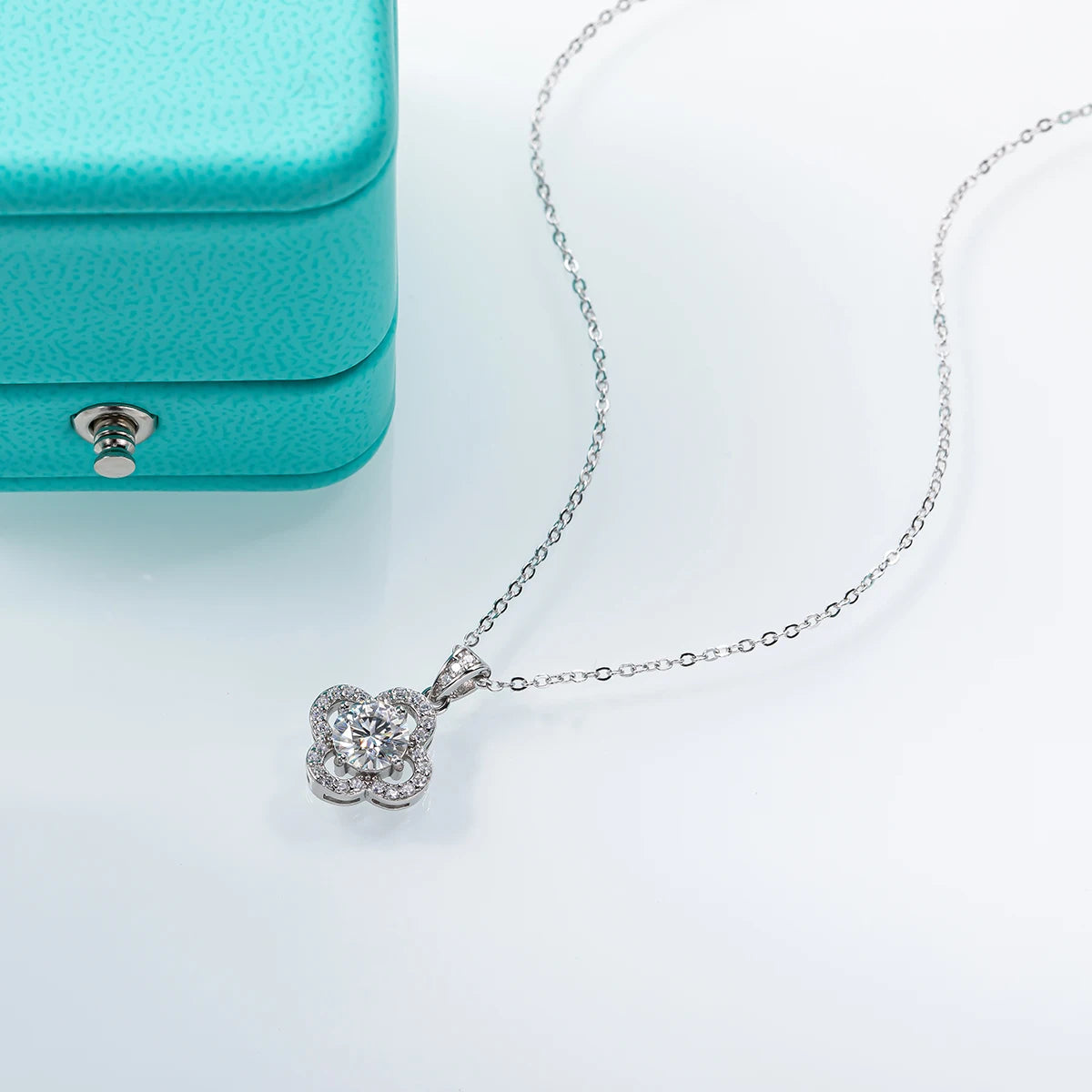 The Halo Necklace worn on neck — 1ct moissanite floral halo pendant — Aurora Moissanite