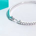 Moissanite half-eternity bracelet 3mm, side angle, 18K white gold plated sterling silver — Aurora Moissanite