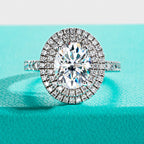 The Iris Ring worn — 3ct oval moissanite double halo, 18K gold plated — Aurora Moissanite