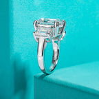 12cttw emerald moissanite 3-stone engagement ring, side profile view — Aurora Moissanite