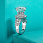 4.92cttw moissanite halo ring, side profile, 18K gold — Aurora Moissanite