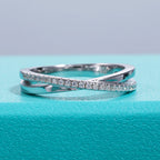 The Lace Band lifestyle — moissanite cross pattern ring worn on finger — Aurora Moissanite