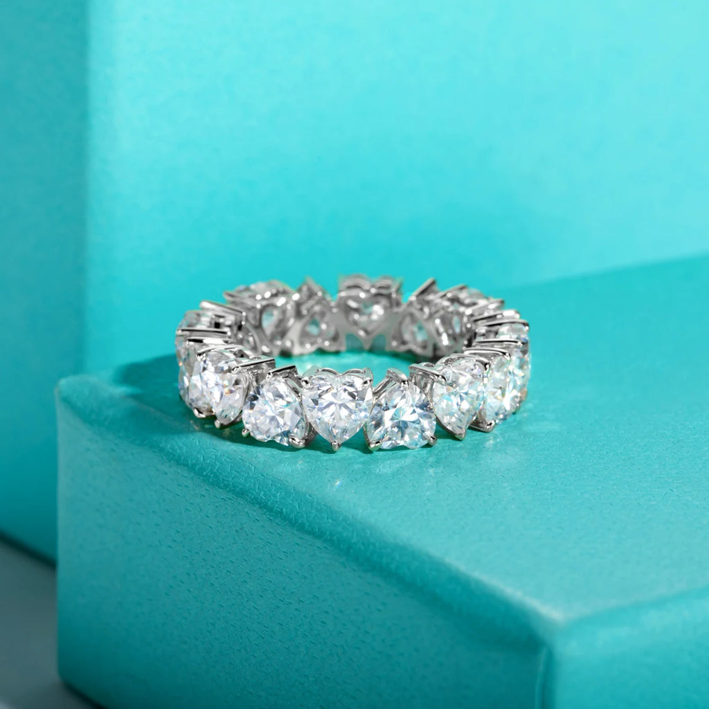The Bloom Band lifestyle — 5mm heart moissanite eternity band worn on finger — Aurora Moissanite