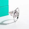 The Wren Ring worn — 4ct pear cut moissanite crown engagement ring — Aurora Moissanite