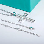 Moissanite cross pendant necklace top view showing D color VVS1 round stones — Aurora Moissanite