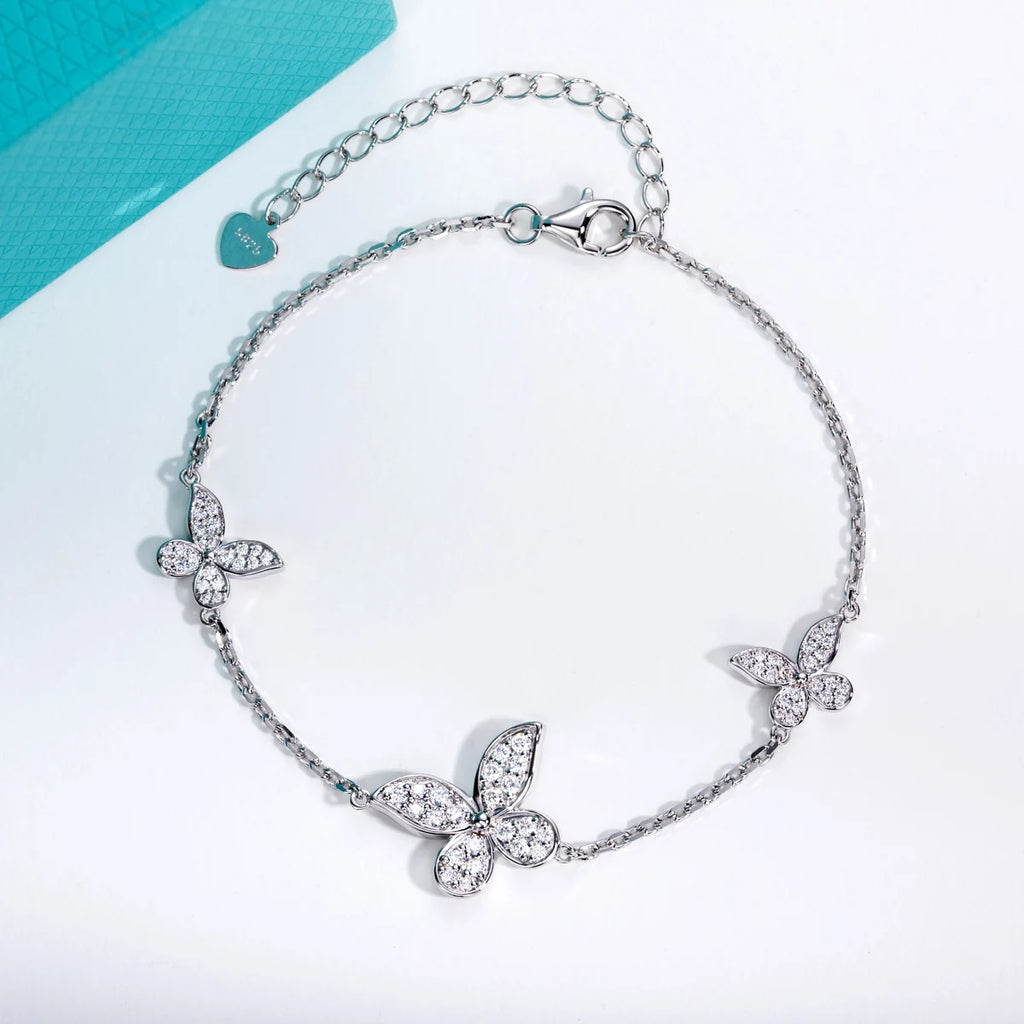 The Wing Bracelet — moissanite butterfly charm bracelet, alternate angle — Aurora Moissanite