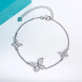 The Wing Bracelet — moissanite butterfly charm bracelet, alternate angle — Aurora Moissanite