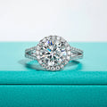 The Ina Ring worn — 3ct round moissanite halo ring, 18K gold — Aurora Moissanite