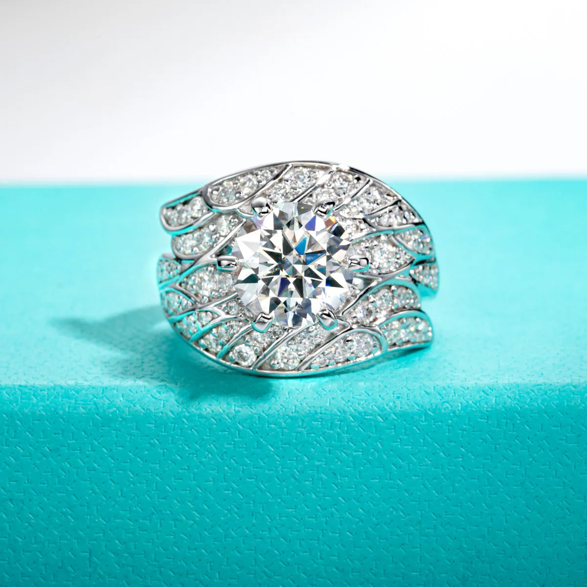 The Veil Ring — 4ct moissanite angel wing ring, front view, sterling silver — Aurora Moissanite