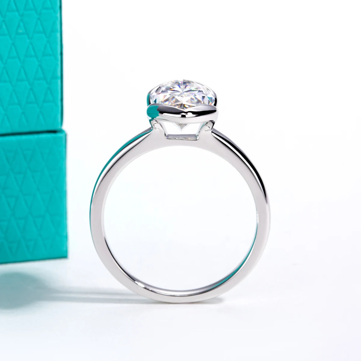 The Oryn Ring lifestyle — marquise moissanite half-bezel worn on finger — Aurora Moissanite