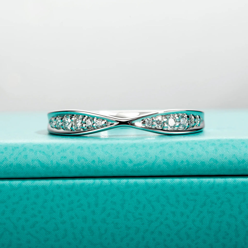 The Knot Band — moissanite bow-tie ring, front view, 18K gold plated — Aurora Moissanite