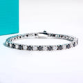 The Roan Bracelet worn — 4mm black moissanite tennis bracelet, sterling silver — Aurora Moissanite