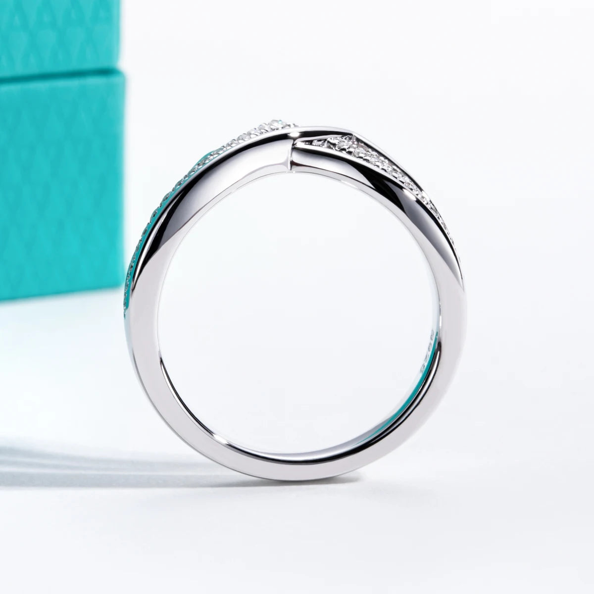 The Eden Band lifestyle — moissanite V-shape ring worn with engagement ring — Aurora Moissanite