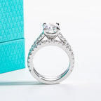 The Dova Ring lifestyle — oval moissanite bridal set worn on finger — Aurora Moissanite