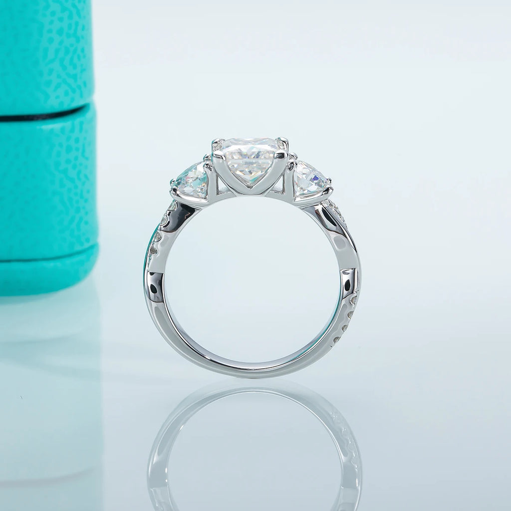 The Tove Ring worn — 1.5cttw princess three-stone moissanite, S925 — Aurora Moissanite