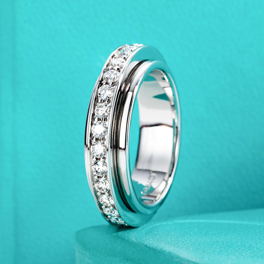 Moissanite spinner ring, side profile, outer band rotating on inner band — Aurora Moissanite