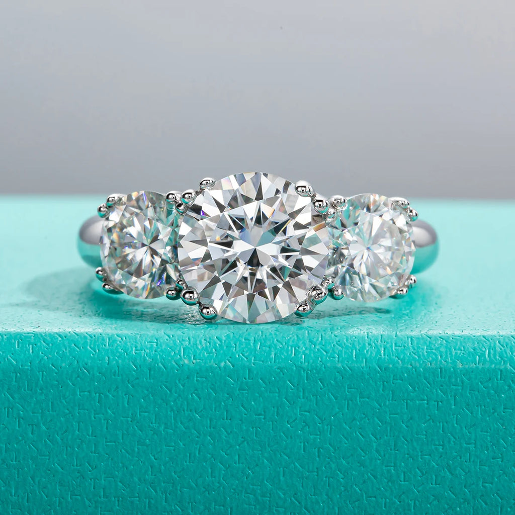 Three stone moissanite 5cttw D color VVS1, center 3ct plus two 1ct side stones — Aurora Moissanite
