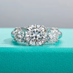Three stone moissanite 5cttw D color VVS1, center 3ct plus two 1ct side stones — Aurora Moissanite