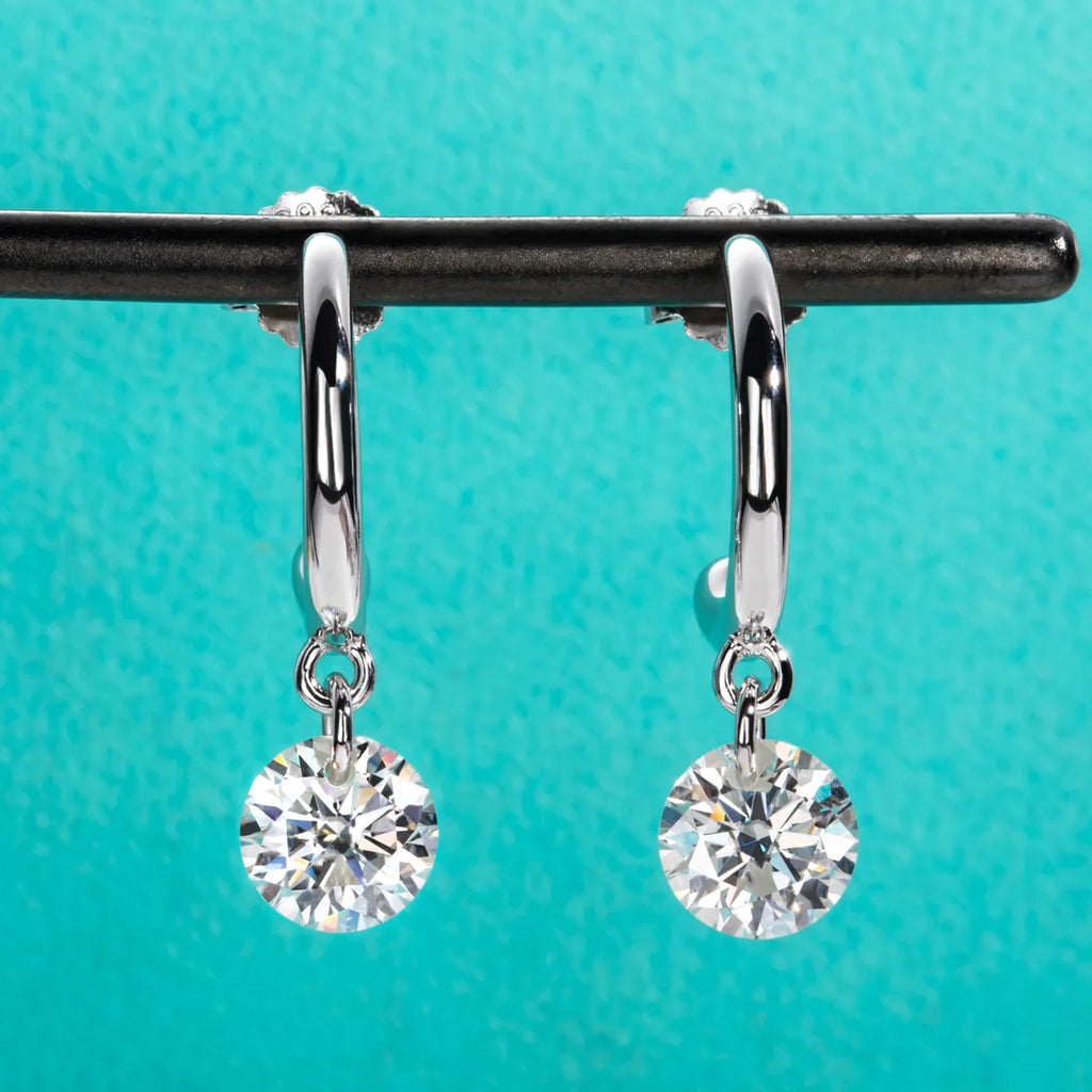 The Aura Earrings — 2cttw moissanite drop studs, front view — Aurora Moissanite