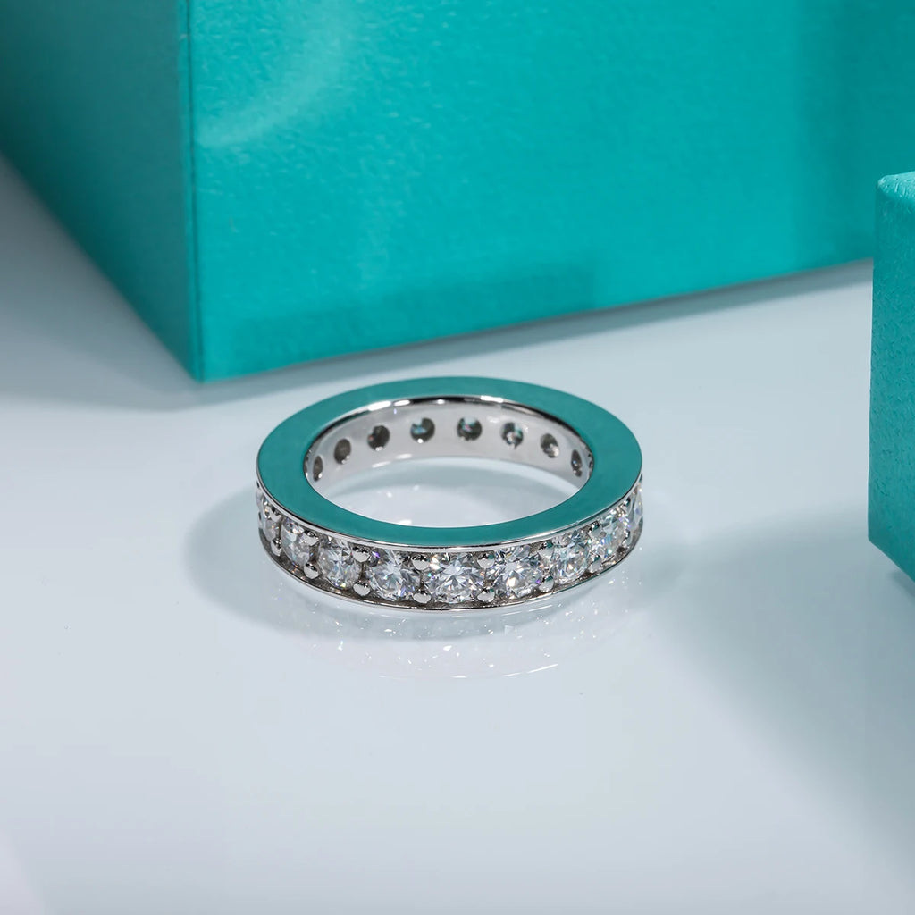 The Ora Band — 3.5mm moissanite eternity ring, front view, 18K white gold — Aurora Moissanite