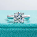 The Neve Ring worn — 3.5ct cushion gray moissanite solitaire engagement ring — Aurora Moissanite