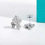 The Noir Earrings — 0.78cttw iced cross studs, front — Aurora Moissanite