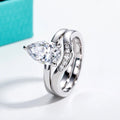 The Triana Ring worn — 3ct pear moissanite bridal ring set, S925 — Aurora Moissanite