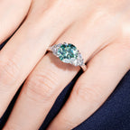 Blue-green moissanite top view, 3ct teal stone in gold setting — Aurora Moissanite