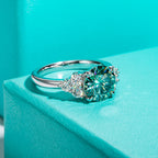Blue-green moissanite 3ct, teal body color with fire, 18K gold ring — Aurora Moissanite