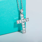 The Crux Pendant — round moissanite cross necklace lifestyle shot, S925 silver — Aurora Moissanite