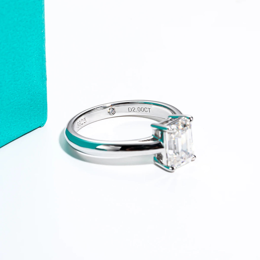 The Brae Ring lifestyle — 2ct emerald moissanite worn on finger — Aurora Moissanite