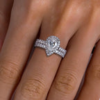 The Oria Ring lifestyle — 3ct pear halo moissanite bridal set worn on finger — Aurora Moissanite