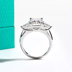 Emerald cut moissanite 4ct with pear 0.5ct D color VVS1, two-stone detail — Aurora Moissanite