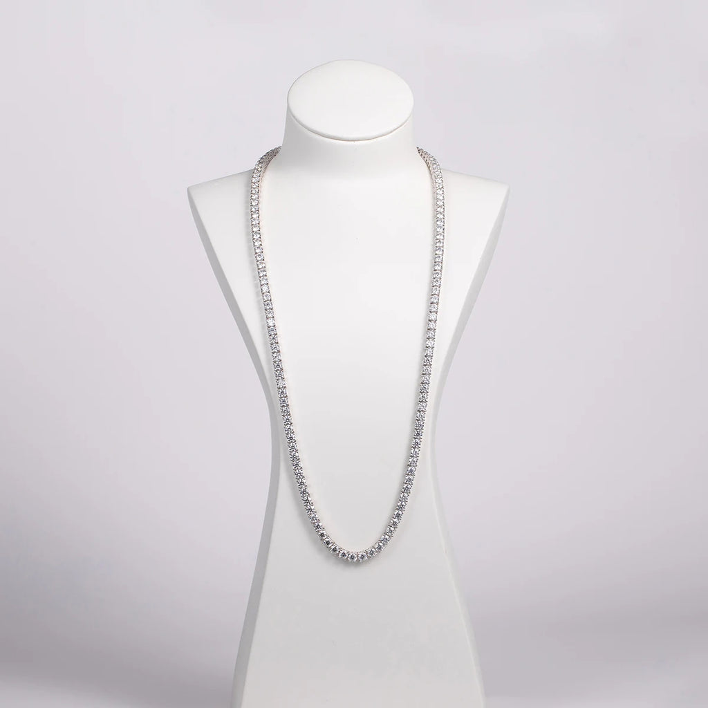The Strand Necklace worn — 4mm moissanite tennis necklace on neck, 18K gold plated — Aurora Moissanite