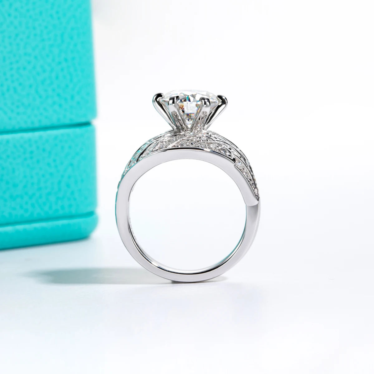 The Veil Ring lifestyle — moissanite angel wing ring worn on finger — Aurora Moissanite