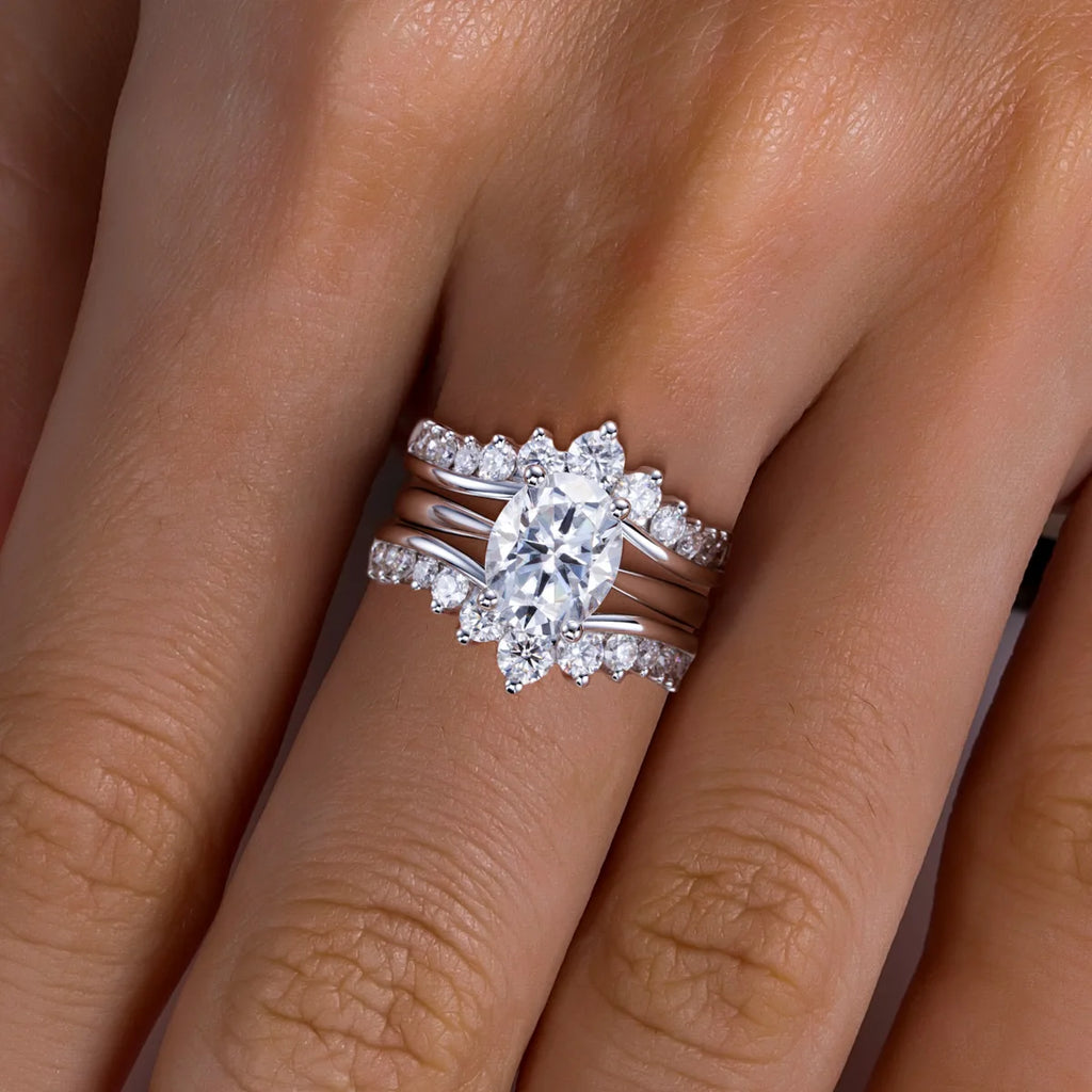 Oval moissanite bridal set top view, 18K gold, ring and band — Aurora Moissanite