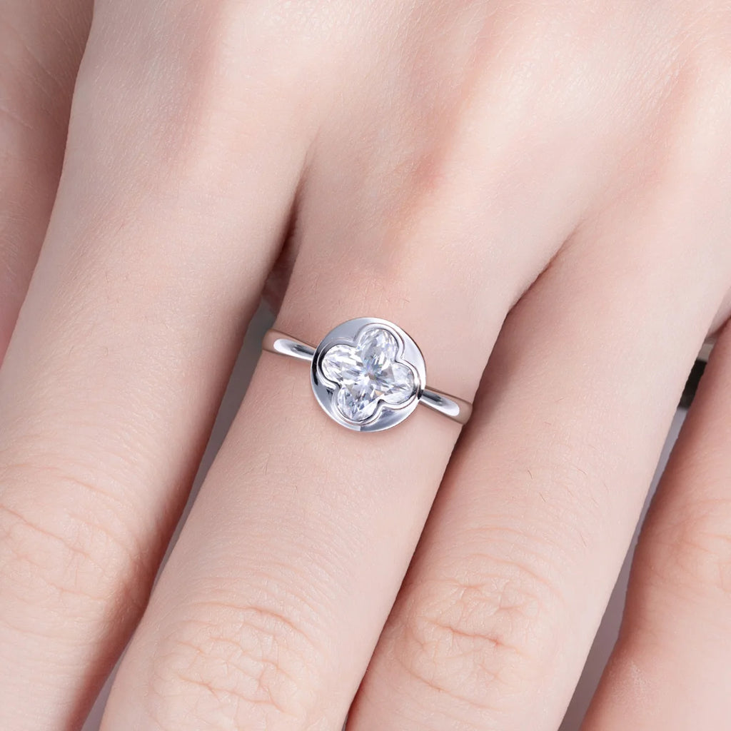Four-leaf clover moissanite ring top view, bezel fitted to clover outline — Aurora Moissanite