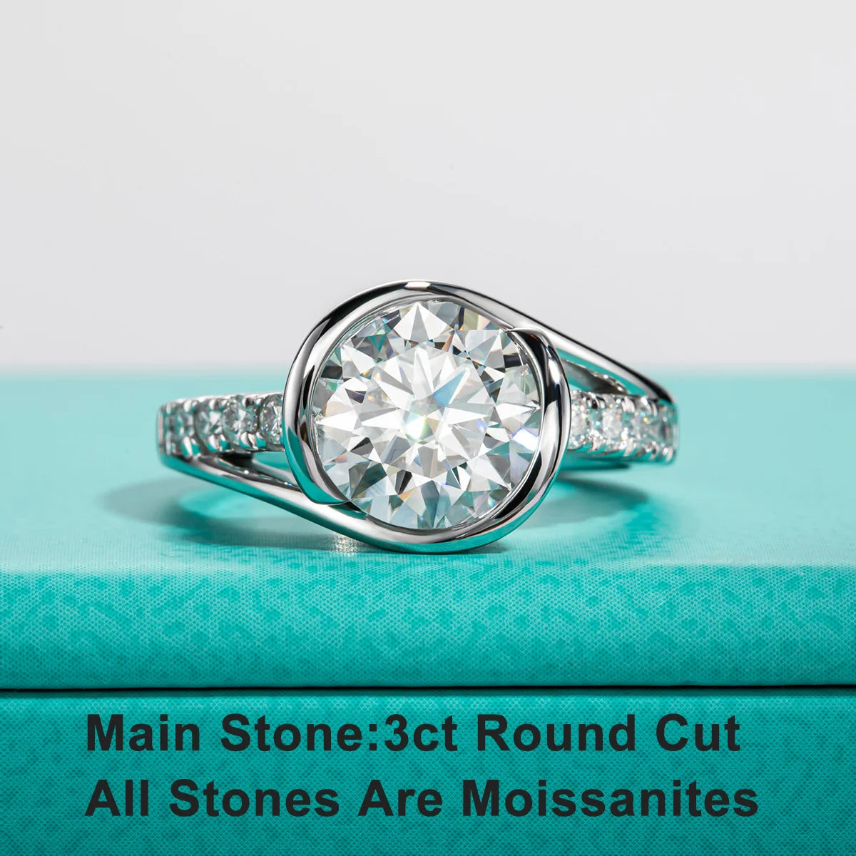 Top view of 3ct round moissanite bezel ring showing clean continuous bezel setting — Aurora Moissanite